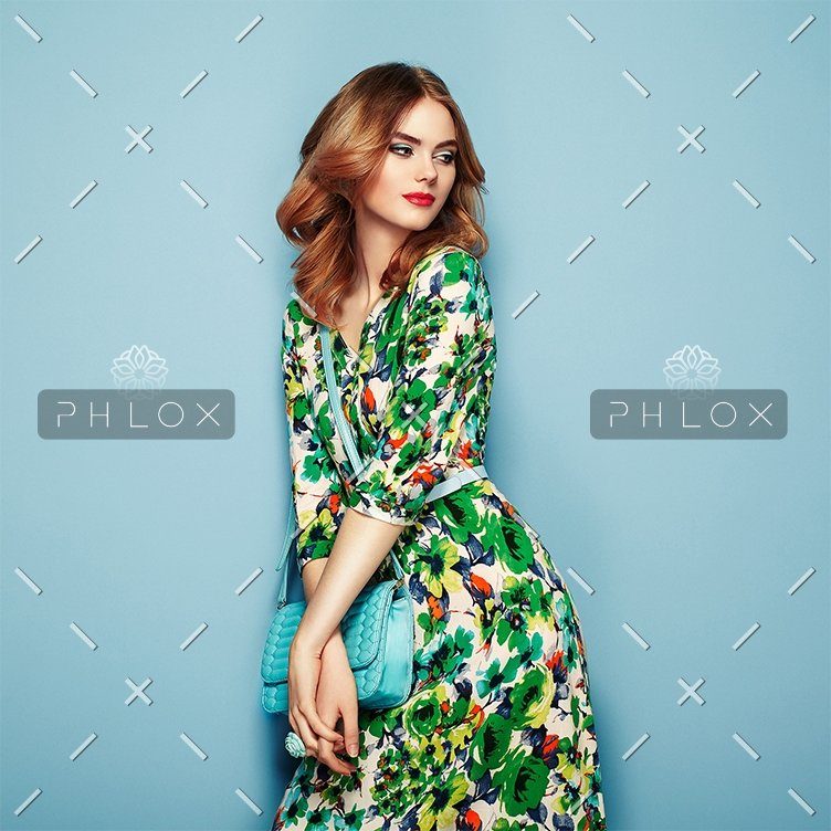woman-in-floral-spring-summer-dress-P68ZMJ4